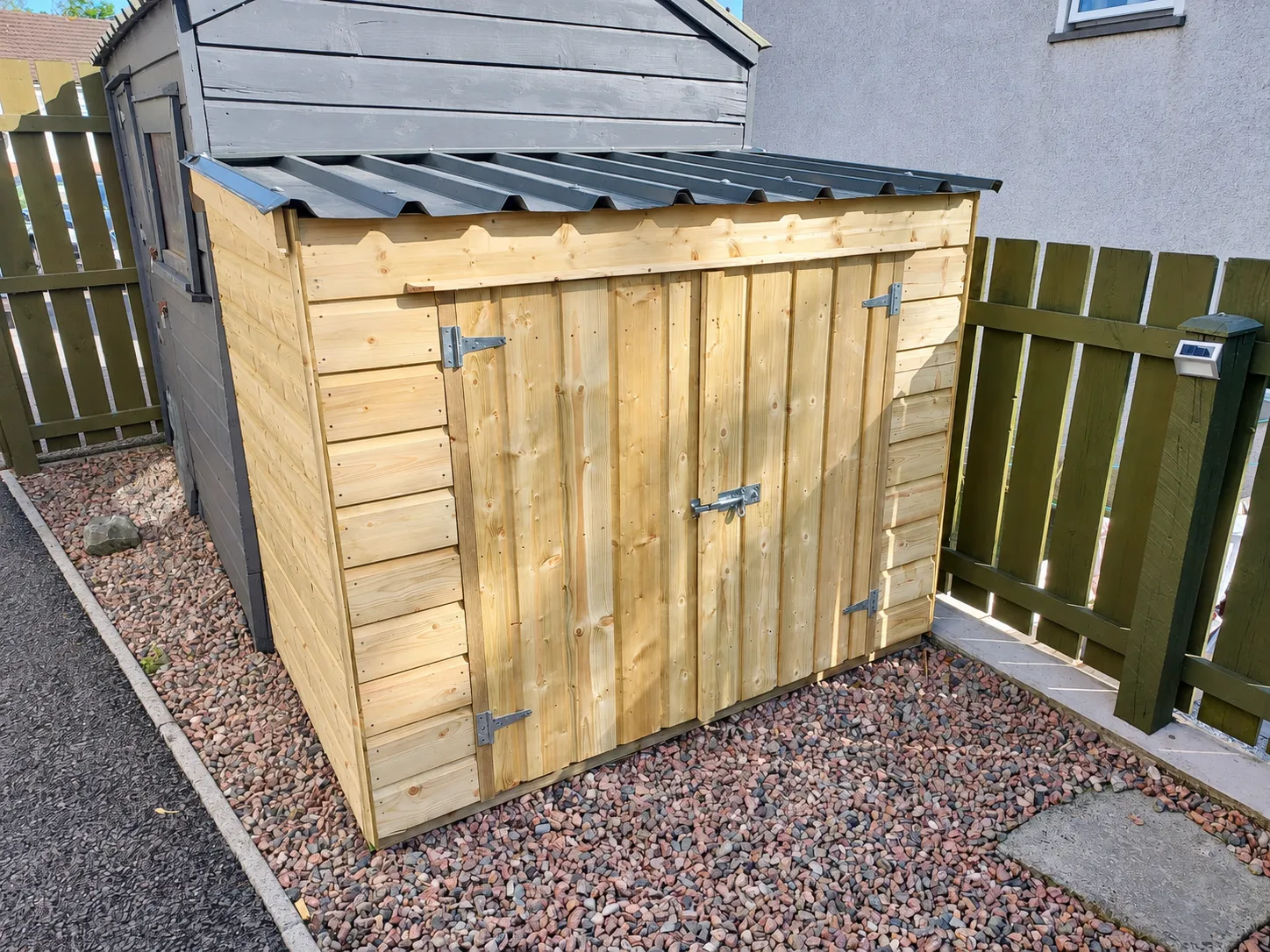 Compact timber garden shed with double doors